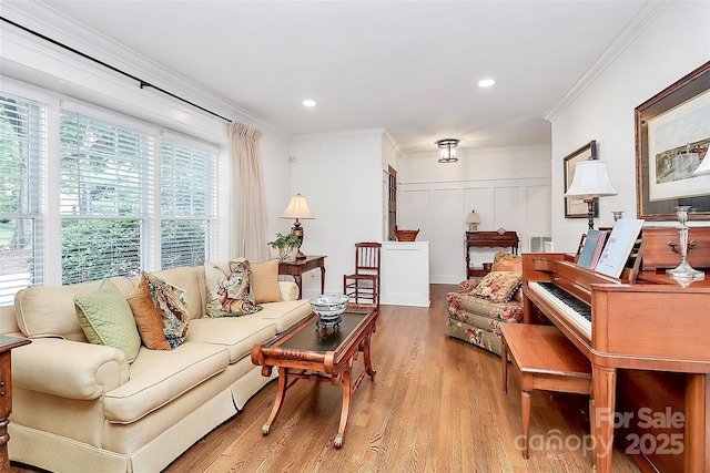 427 Lansdowne Rd, Charlotte, NC 28270 - living room with light wood-style floors, crown molding, recessed lighting, and a decorative wall