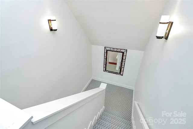 427 Lansdowne Rd, Charlotte, NC 28270 - staircase featuring vaulted ceiling and baseboards
