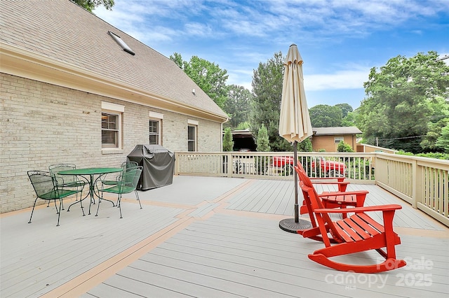 427 Lansdowne Rd, Charlotte, NC 28270 - wooden deck featuring grilling area and outdoor dining area