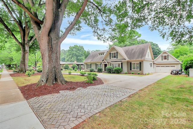 427 Lansdowne Rd, Charlotte, NC 28270 - craftsman-style home with driveway, a front lawn, and an attached garage