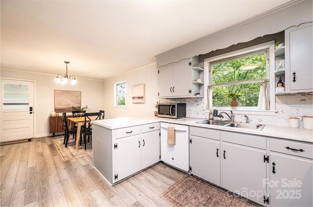 464 23rd Avenue Dr NE, Hickory, NC 28601 - kitchen featuring dishwasher, open shelves, stainless steel microwave, a peninsula, and light countertops