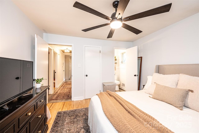 464 23rd Avenue Dr NE, Hickory, NC 28601 - bedroom with light wood-style floors, ceiling fan, and ensuite bath