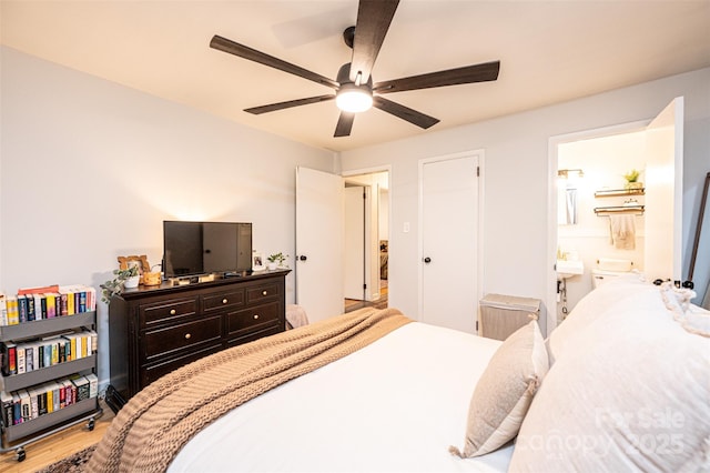 464 23rd Avenue Dr NE, Hickory, NC 28601 - bedroom with wood finished floors, connected bathroom, and a ceiling fan
