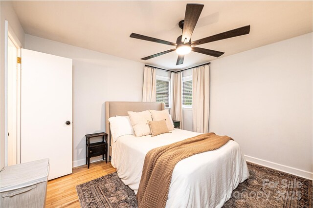 464 23rd Avenue Dr NE, Hickory, NC 28601 - bedroom featuring light wood finished floors and ceiling fan