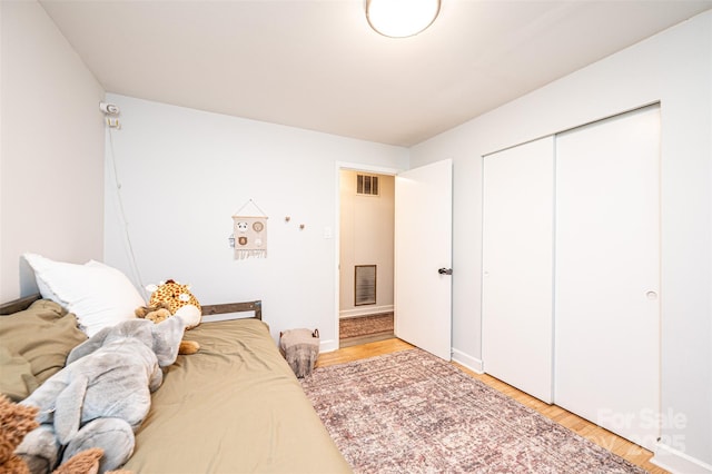 464 23rd Avenue Dr NE, Hickory, NC 28601 - bedroom featuring light wood finished floors and a closet
