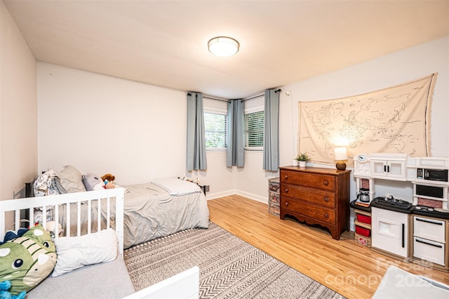 464 23rd Avenue Dr NE, Hickory, NC 28601 - bedroom with light wood finished floors and baseboards