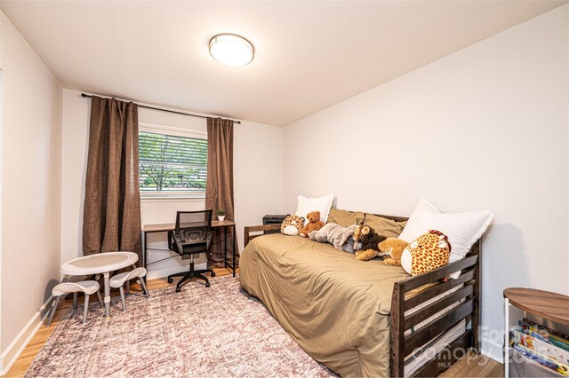 464 23rd Avenue Dr NE, Hickory, NC 28601 - bedroom with wood finished floors and baseboards