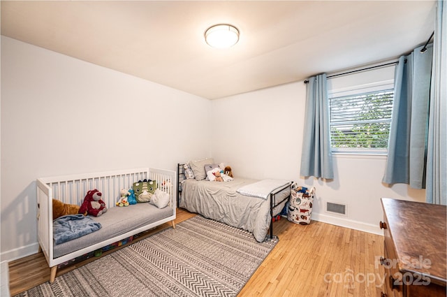 464 23rd Avenue Dr NE, Hickory, NC 28601 - bedroom featuring wood finished floors