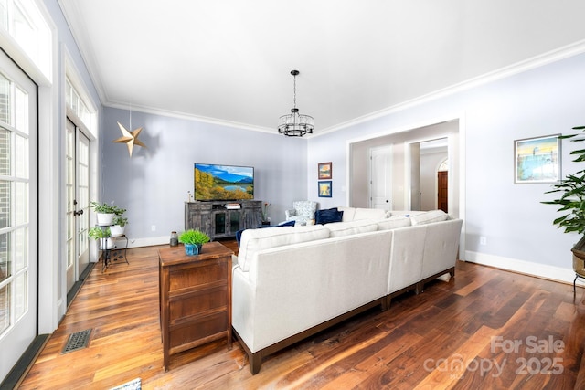 200 Galey Rdg, Cramerton, NC 28032 - living room with ornamental molding, wood finished floors, and a chandelier