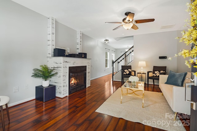 181 Farington Cir, Fletcher, NC 28732 - living room with a ceiling fan, stairs, wood finished floors, and a glass covered fireplace