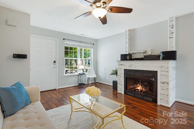 181 Farington Cir, Fletcher, NC 28732 - living room featuring ceiling fan, a glass covered fireplace, and wood finished floors