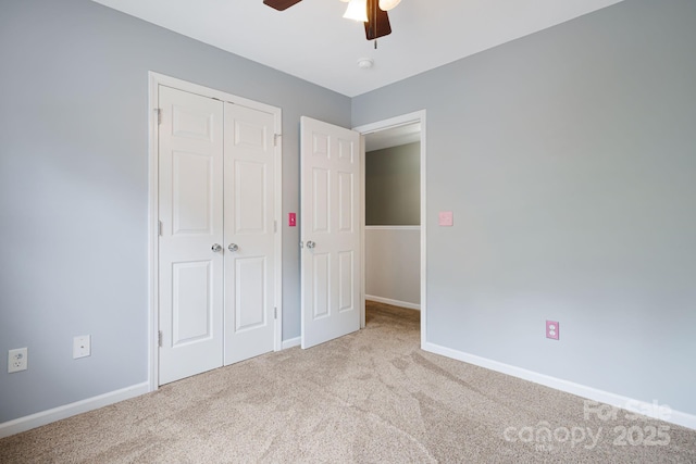 181 Farington Cir, Fletcher, NC 28732 - unfurnished bedroom featuring carpet flooring, a closet, and ceiling fan