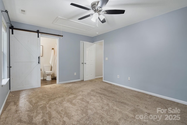 181 Farington Cir, Fletcher, NC 28732 - unfurnished bedroom featuring carpet, attic access, ensuite bathroom, and a ceiling fan