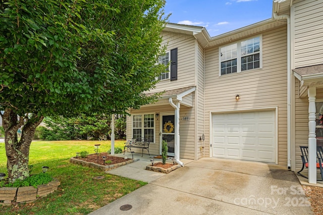 181 Farington Cir, Fletcher, NC 28732 - view of front facade featuring a garage, a front yard, and concrete driveway
