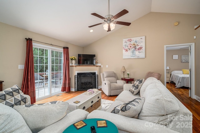 515 E Carpenter St, Maiden, NC 28650 - living area with lofted ceiling, ceiling fan, a fireplace, and wood finished floors
