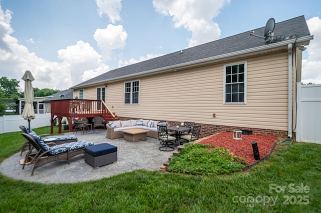 515 E Carpenter St, Maiden, NC 28650 - rear view of house featuring a wooden deck, an outdoor hangout area, a fenced backyard, and a patio