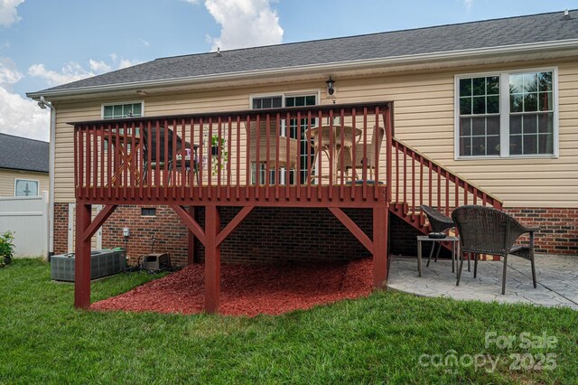 515 E Carpenter St, Maiden, NC 28650 - back of house featuring a lawn, a patio area, and a wooden deck
