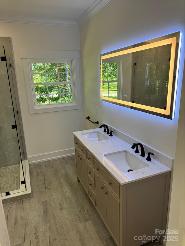 7187 Sherrills Ford Rd, Sherrills Ford, NC 28673 - full bathroom with a stall shower, crown molding, wood finished floors, and double vanity