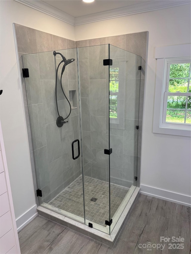 7187 Sherrills Ford Rd, Sherrills Ford, NC 28673 - bathroom featuring wood finished floors, a stall shower, and crown molding
