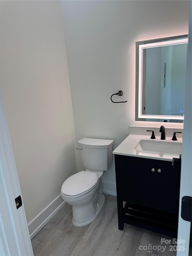 7187 Sherrills Ford Rd, Sherrills Ford, NC 28673 - half bathroom with wood finished floors and vanity