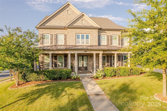 5266 Meadowcroft Way, Fort Mill, SC 29708 - view of front of property featuring a standing seam roof, a front lawn, covered porch, french doors, and brick siding