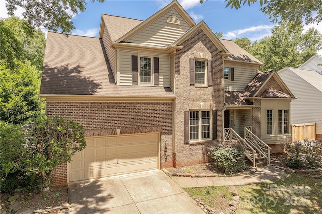 2836 Providence Spring Ln, Charlotte, NC 28270 - traditional-style house with driveway, brick siding, an attached garage, and roof with shingles