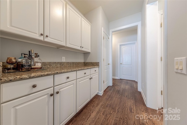 2836 Providence Spring Ln, Charlotte, NC 28270 - corridor with dark wood-style flooring and baseboards