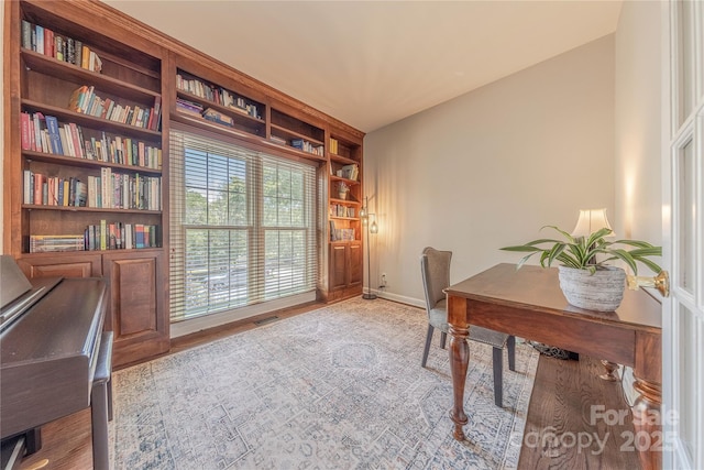 2836 Providence Spring Ln, Charlotte, NC 28270 - office area with built in features and wood finished floors