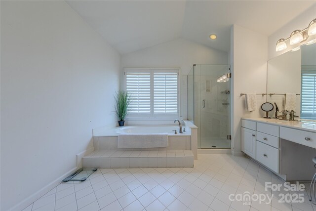 2836 Providence Spring Ln, Charlotte, NC 28270 - bathroom with tile patterned floors, vanity, a garden tub, a shower stall, and lofted ceiling