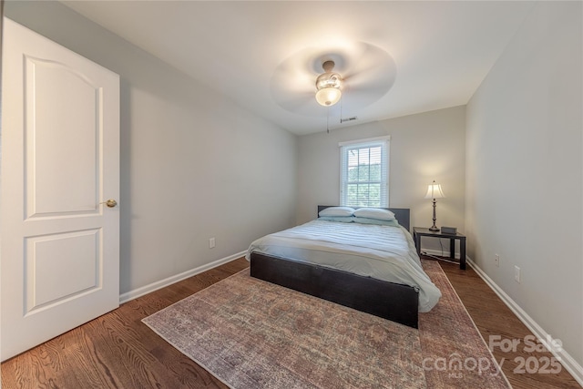 2836 Providence Spring Ln, Charlotte, NC 28270 - bedroom with wood finished floors and a ceiling fan