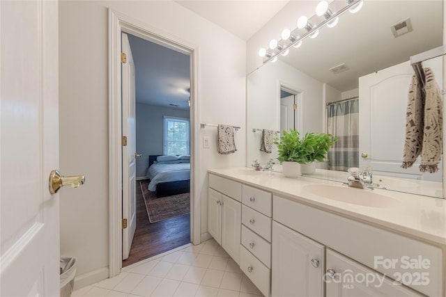 2836 Providence Spring Ln, Charlotte, NC 28270 - ensuite bathroom featuring double vanity and tile patterned flooring