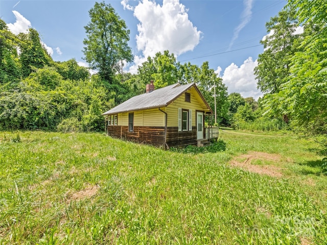 55 Shook St, Clyde, NC 28721 - view of side of property featuring a metal roof