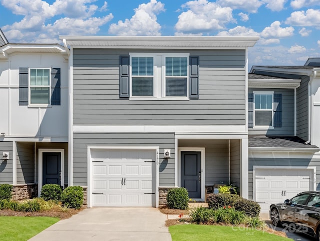 4170 County Down Ave, Kannapolis, NC 28081 - multi unit property with a garage, concrete driveway, and stone siding