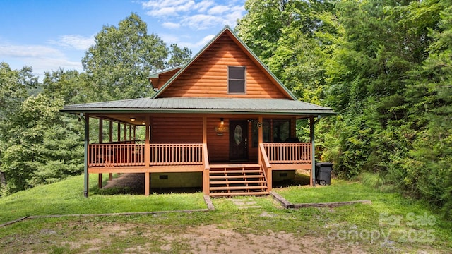 55 Kirkland Mountain Ln, Bryson City, NC 28713 - view of front facade featuring faux log siding, a metal roof, and a porch