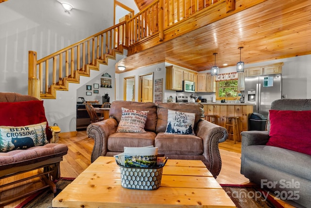 55 Kirkland Mountain Ln, Bryson City, NC 28713 - living area with light wood-style flooring and stairs