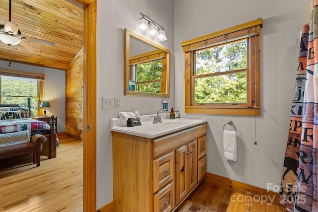 55 Kirkland Mountain Ln, Bryson City, NC 28713 - bathroom with wood finished floors, vanity, wooden ceiling, a ceiling fan, and lofted ceiling
