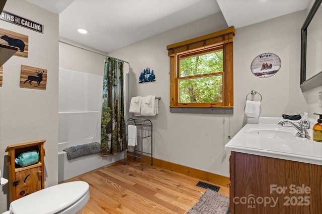55 Kirkland Mountain Ln, Bryson City, NC 28713 - bathroom with wood finished floors, vanity, shower / bathtub combination with curtain, and recessed lighting