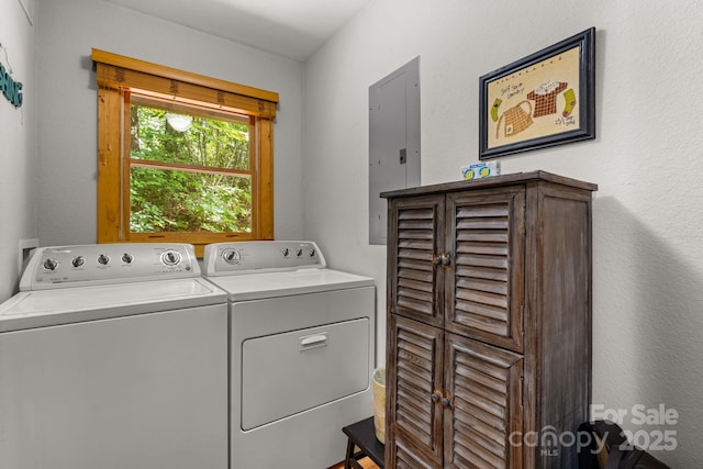 55 Kirkland Mountain Ln, Bryson City, NC 28713 - laundry area with washing machine and dryer, electric panel, and cabinet space