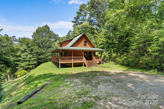 55 Kirkland Mountain Ln, Bryson City, NC 28713 - back of property featuring covered porch and a metal roof