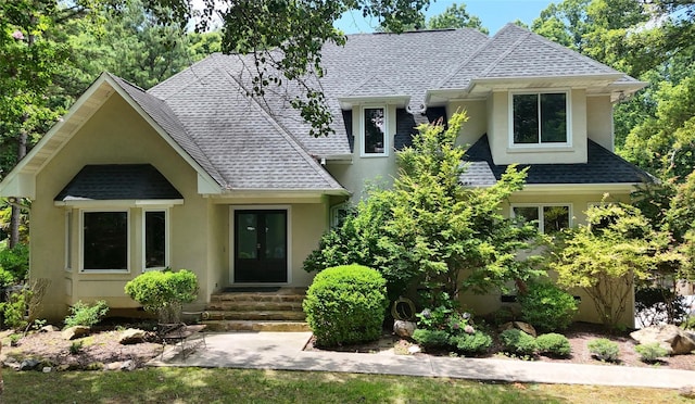 1802 Walden Pond Ln, Waxhaw, NC 28173 - view of front of home featuring a shingled roof, french doors, stucco siding, and entry steps
