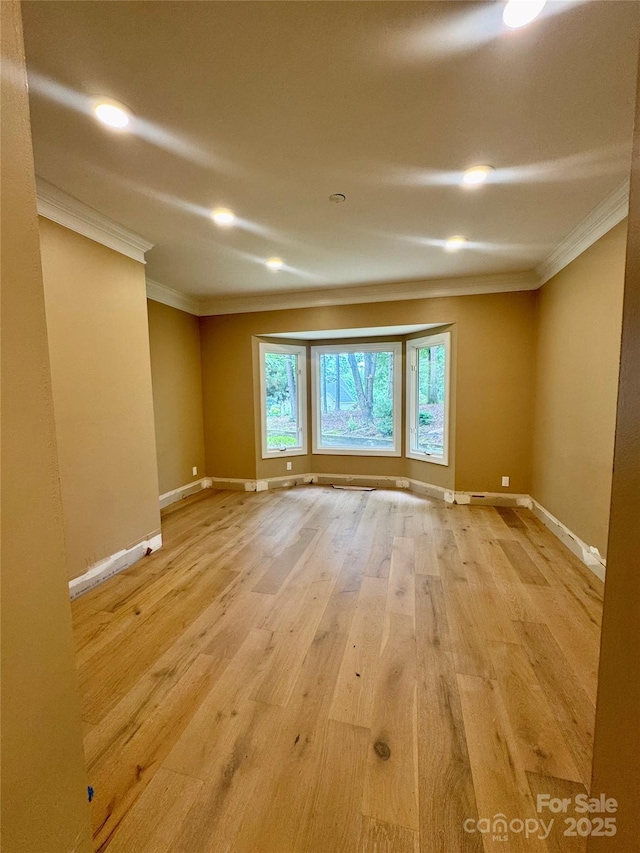 1802 Walden Pond Ln, Waxhaw, NC 28173 - unfurnished room featuring ornamental molding, light wood-style flooring, and recessed lighting
