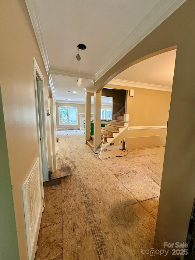 1802 Walden Pond Ln, Waxhaw, NC 28173 - hall with ornate columns, crown molding, arched walkways, and stairway