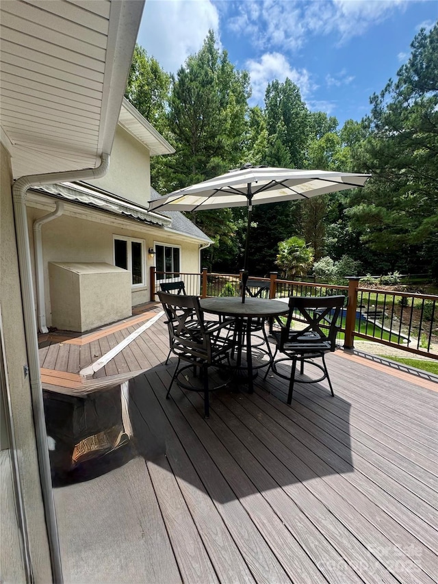 1802 Walden Pond Ln, Waxhaw, NC 28173 - deck featuring outdoor dining space and view of wooded area