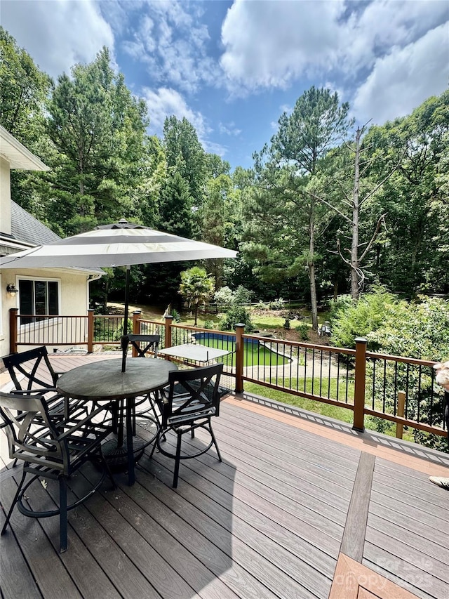 1802 Walden Pond Ln, Waxhaw, NC 28173 - deck featuring outdoor dining area and view of scattered trees