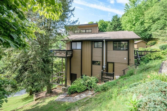 153 Country Ridge Rd, Laurel Park, NC 28739 - rear view of house with a deck