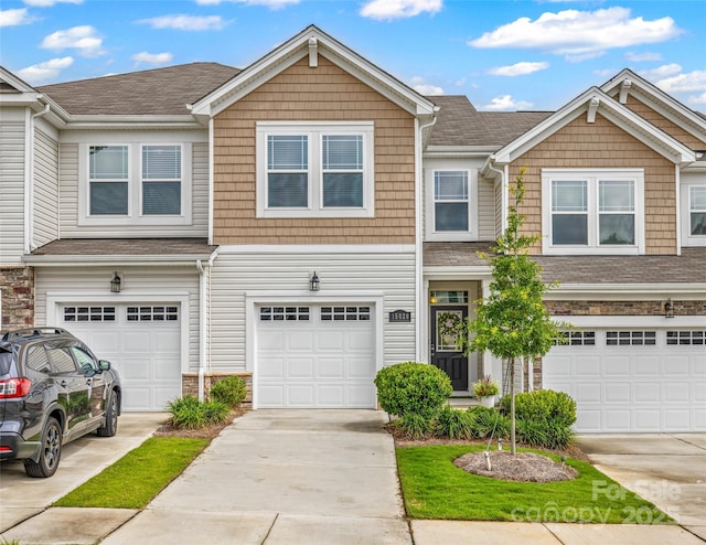 15626 Little Bluestem St, Charlotte, NC 28278 - multi unit property featuring a garage, stone siding, driveway, and a shingled roof