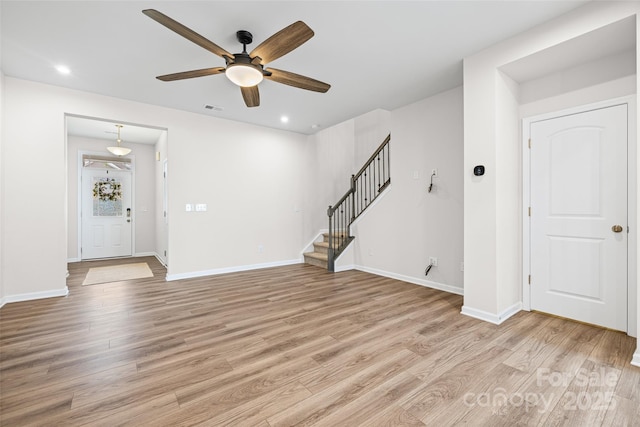 15626 Little Bluestem St, Charlotte, NC 28278 - unfurnished living room with ceiling fan, light wood-type flooring, stairs, and recessed lighting
