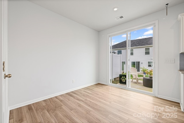 15626 Little Bluestem St, Charlotte, NC 28278 - empty room with light wood-style floors and recessed lighting