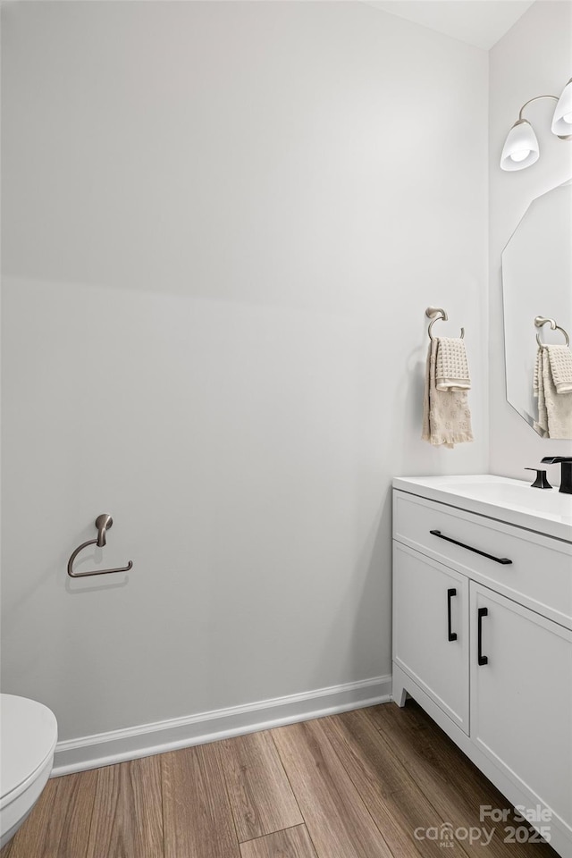 15626 Little Bluestem St, Charlotte, NC 28278 - half bath featuring vanity and wood finished floors