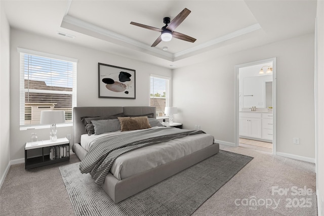 15626 Little Bluestem St, Charlotte, NC 28278 - bedroom with a raised ceiling, ornamental molding, light colored carpet, ensuite bath, and ceiling fan